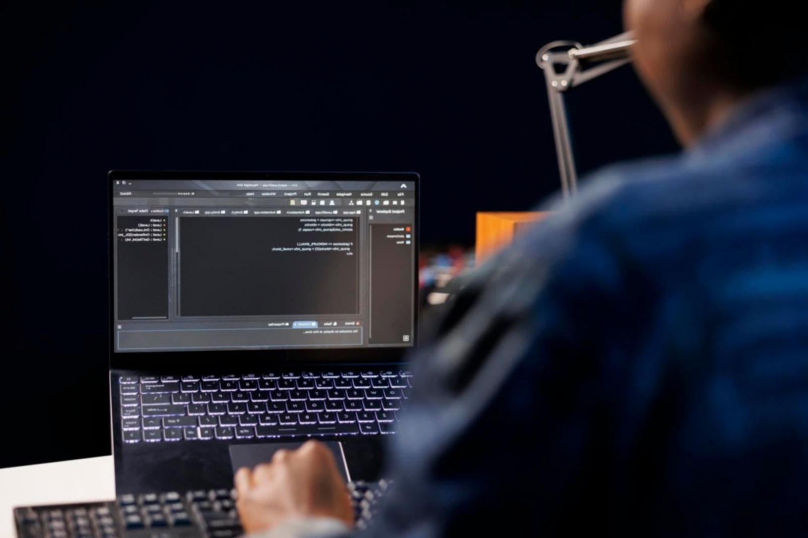 Modern office workspace with performance monitoring dashboards and testing equipment