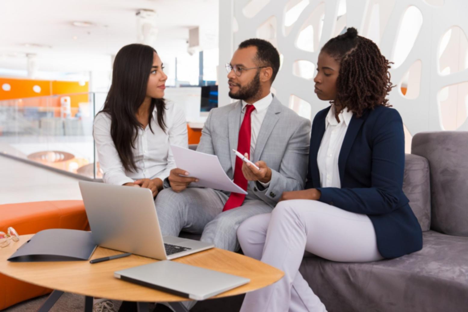 Performance testing environment with multiple monitoring screens showing system metrics
